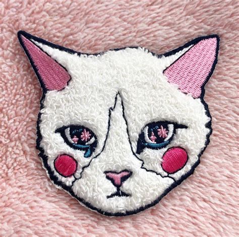 sew on cat patches|More.